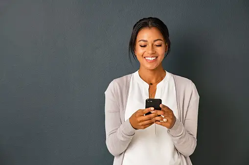 A girl holding a phone